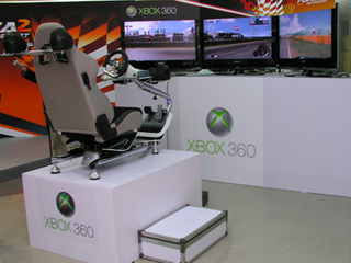 Illustration for article titled VRX Makes The Ultimate Xbox 360 Driving Setup a Reality